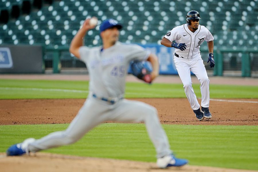 Detroit Tigers third baseman Jeimer Candelario (46) leads off first base as Kansas City Royals pitcher Kyle Zimmer (45) throws a pitch during their MLB game at Comerica Park in Detroit, on Tuesday, July 28, 2020.