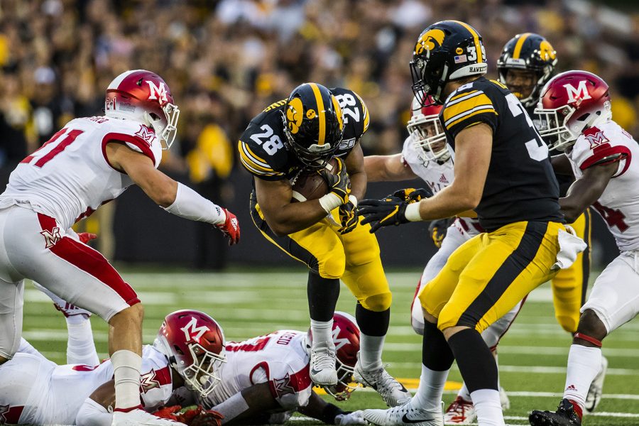 Iowa+running+back+Toren+Young+runs+the+ball+during+the+Iowa+football+game+against+Miami+%28Ohio%29+at+Kinnick+Stadium+on+Saturday%2C+August+31%2C+2019.+The+Hawkeyes+defeated+the+Redhawks+38-14.