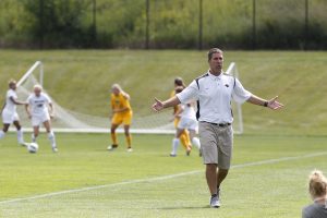 Iowa head coach Ron Rainey reacts to the teams passing against North Dakota at the Iowa Soccer Complex in Iowa City on Sunday, August 19, 2012. The Hawkeyes recorded a 3-0 victory over UND. 