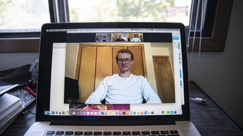 University of Iowa freshman, Julian Wemmie sits down for a Zoom interview from his home on Tuesday, July 28, 2020. Due to health concerns regarding the Coronavirus, the university is changing procedure in ways that encourage some students to do the entire semester virtually.