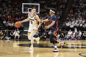 Iowa guard CJ Fredrick attempts to take the ball past Illinois  guard Trent Frazier during a men’s basketball game between the Iowa Hawkeyes and the Illinois Fighting Illini on Sunday, February 2, 2020. The Hawkeyes defeated the Fighting Illini 72-65.