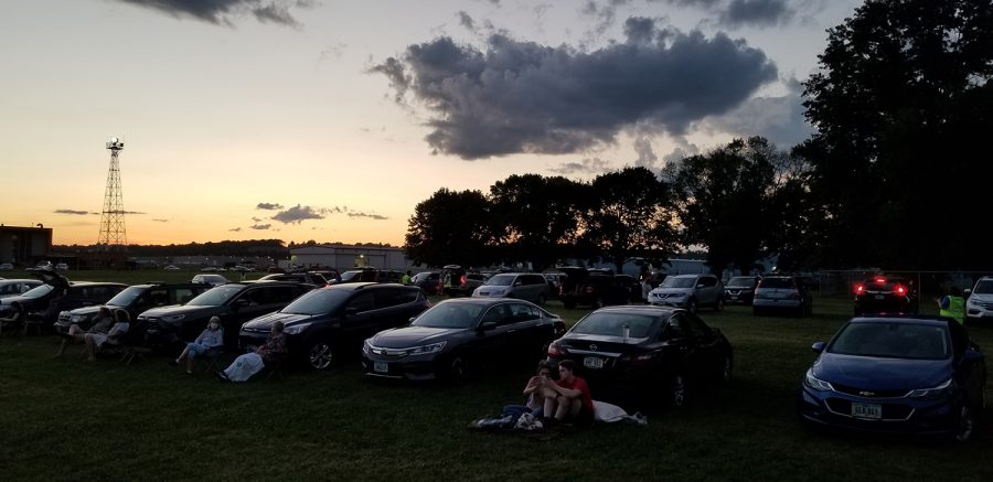 Cars parked on the lawn for the Summer of Arts free movie series, adapted as a drive-in due to the coronavirus pandemic.