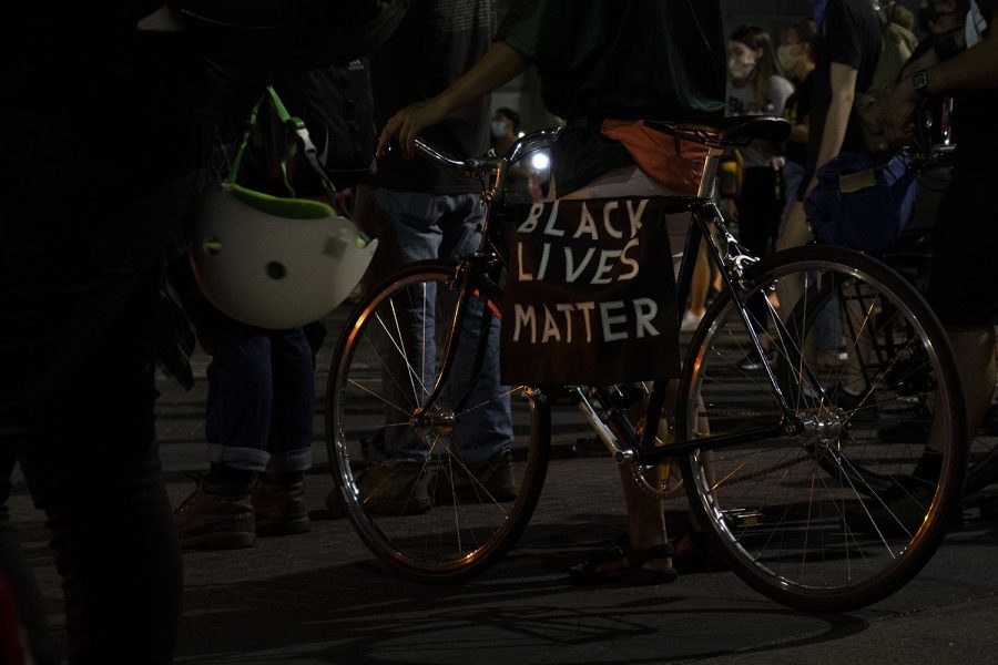 A+BLM+sign+is+seen+on+a+bike+on+Friday%2C+Aug.+28%2C+2020.+Protesters+marched+to+the+Johnson+County+Sheriff%E2%80%99s+Office+and+throughout+downtown+Iowa+City+demanding+justice+for+the+shooting+of+Jacob+Blake+that+happened+on+Sunday+in+Kenosha%2C+Wis.+and+against+the+recent+decision+by+Iowa+City+City+Council+to+give+the+ICPD+%24230%2C000+over+five+years.+%28Hannah+Kinson%2FThe+Daily+Iowan%29
