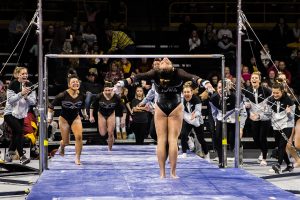 Iowas Jax Kranitz competes on uneven bars during a womens gymnastics meet between Iowa and Iowa State at Carver-Hawkeye Arena on Friday, March 1, 2019. Kranitz scored 9.8 in the event. The Hawkeyes, celebrating senior night, fell to the Cyclones, 196.275-196.250. 