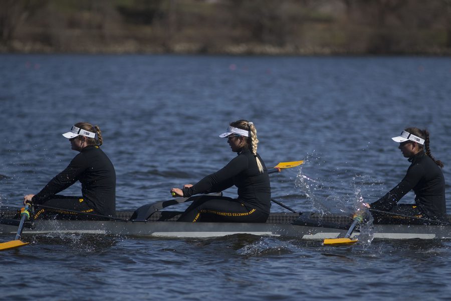 Iowas second varsity crew rows back after losing to Wisconsin by 6.07 seconds in the first session of a womens rowing meet on Lake MacBride on Saturday April 13, 2019. Iowa won 3 out of 12 races with the varsity 8 crew winning both races for the day. 