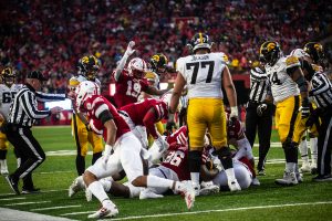 The Nebraska defense jumps on a loose ball during the game against Nebraska on Friday, November 29, 2019. The Hawkeyes defeated the Corn Huskers 27-24.
