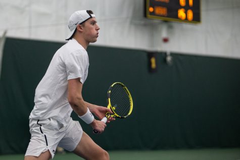 Iowas Joe Tyler eyes the ball during a match against Wichita State University on Sunday, Feb. 16, 2020, at the Hawkeye Tennis and Recreation Complex. The Hawkeyes defeated the Shockers, 4-2.