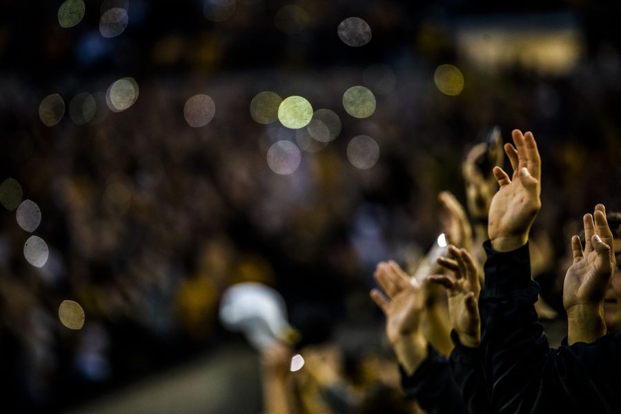 Fans wave after the first quarter during the Iowa football game against Miami (Ohio) at Kinnick Stadium on Saturday, August 31, 2019. The Hawkeyes defeated the Redhawks 38-14.
