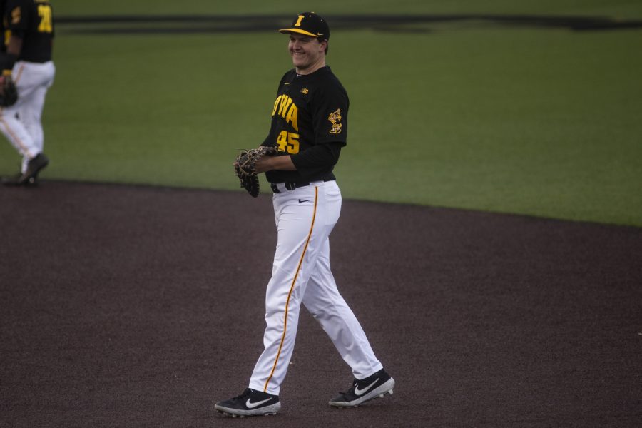 Iowa first baseman Peyton Williams grins during a baseball game between the Iowa Hawkeyes and the Kansas Jayhawks on Tuesday, March 10, at Duane Banks Field. The Hawkeyes defeated the Jayhawks, 8-0. 