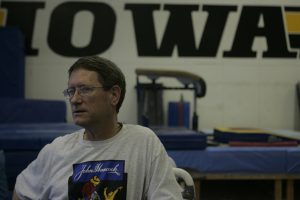 Then-head coach of Iowa Mens Gymnastics, Tom Dunn, watches his gymnasts on Thursday, Dec. 14, 2006 in the Iowa Gymnastics practice room.