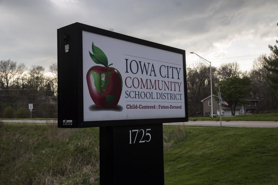 A sign for the Iowa City Community School District is seen outside the districts administration building on Tuesday, April 28. 