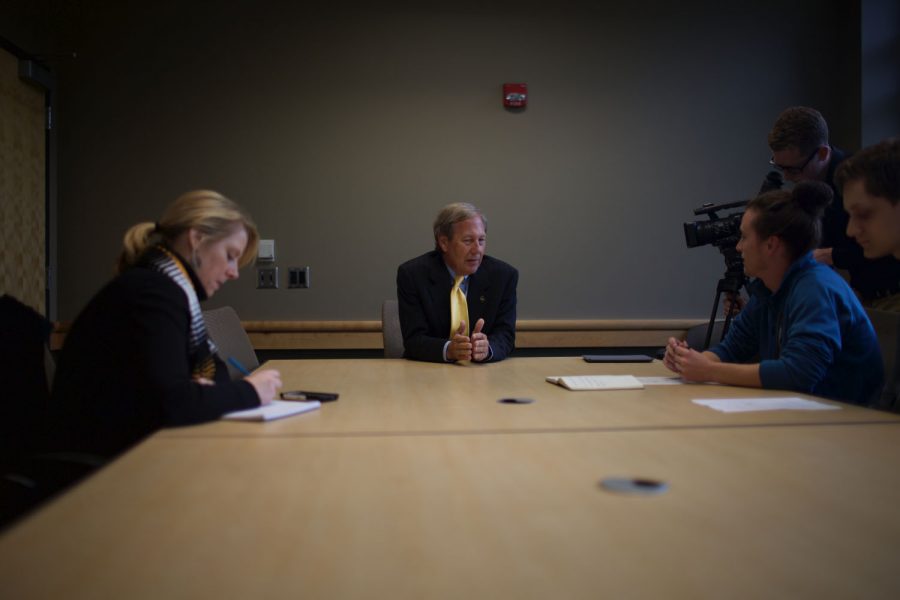 President Bruce Harreld talks with reporters on Oct. 30, 2015 in The Daily Iowan conference room about his upcoming term as the next president of the University of Iowa. Upon his acceptance, Harreld had an approval rating of three percent.