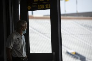 Iowa Head Coach Kirk Ferentz looks down on the stadium before addressing members of the press during football media day in Kinnick Stadium on Thursday, Oct. 8, 2020. “It’s not a normal media day by any stretch, but what it does signify is that we’re one step closer to getting on with football,” Ferentz said. “It’s been great to get started with practice.” 