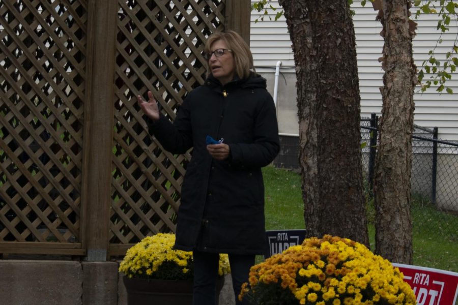 Rita Hart is seen speaking during her backyard tours on Saturday, Oct. 24, 2020.