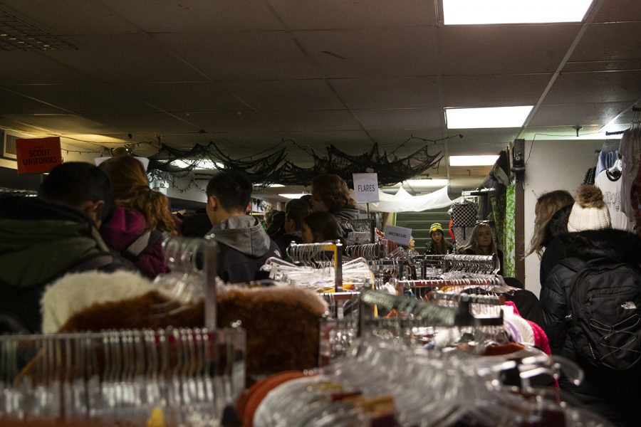 The checkout line at Ragstock in Downtown Iowa City on October 31, 2019. The line extended towards the back of the store with stragglers still choosing their Halloween costumes.