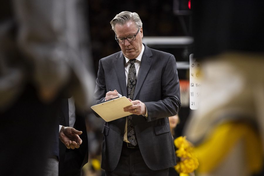 Iowa head coach Fran McCaffery draws up plays during a timeout during a men’s basketball game between Iowa and Penn State on Saturday, Feb. 29 at Carver-Hawkeye Arena. The Hawkeyes defeated the Nittany Lions 77-68. 