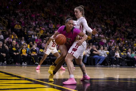 Iowa guard Alexis Sevillian drives the ball to the hoop during a women’s basketball between Iowa and Wisconsin at Carver-Hawkeye Arena on Sunday, Feb. 16, 2020. The Hawkeyes defeated the Badgers 97-71.