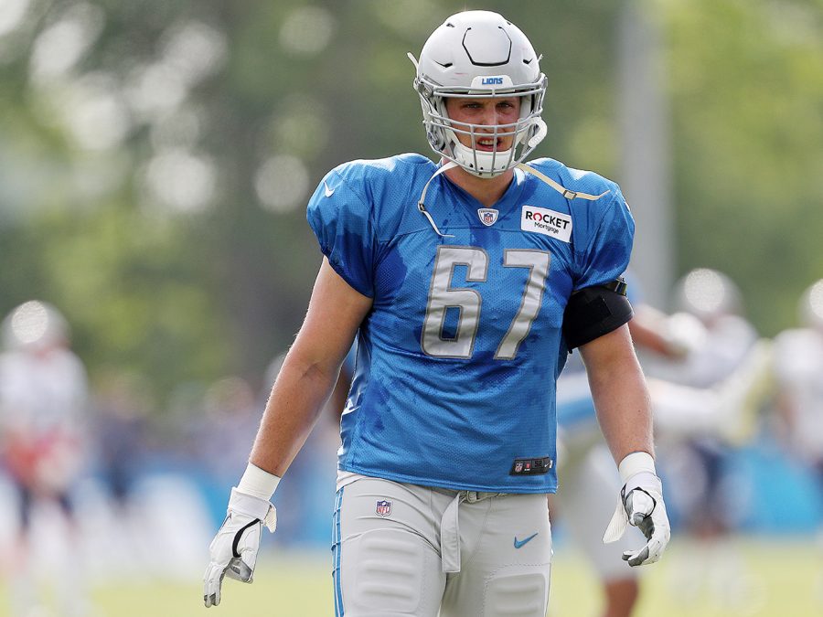 Detroit Lions offensive lineman Matt Nelson (67) stretches during their joint training camp practice with the New England Patriots at their team headquarters in Allen Park, on Tuesday, August 6, 2019.