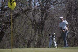 Joe Kim watches the ball approach the flag during a golf invitational at Finkbine Golf Course on Saturday, April 20, 2019. Iowa came in first with a score of 593 against 12 other teams.