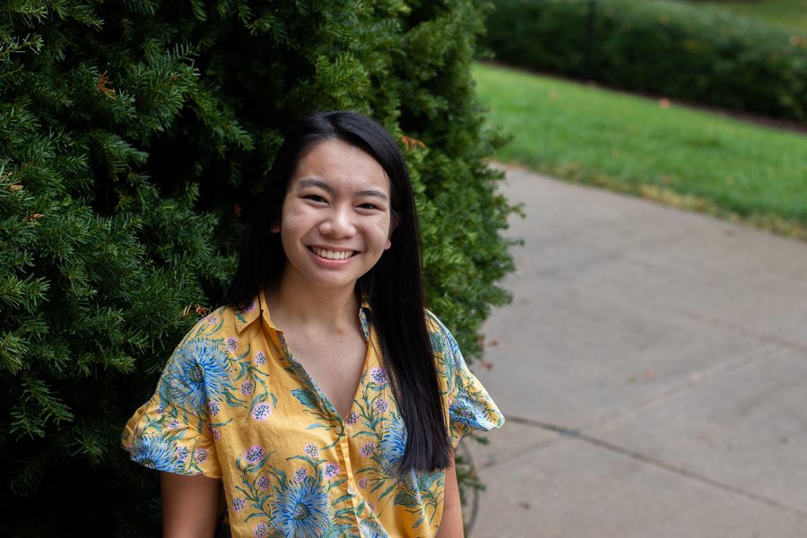 University of Iowa sophomore Rachel Li poses for a portrait on the steps of Schaffer Hall. 