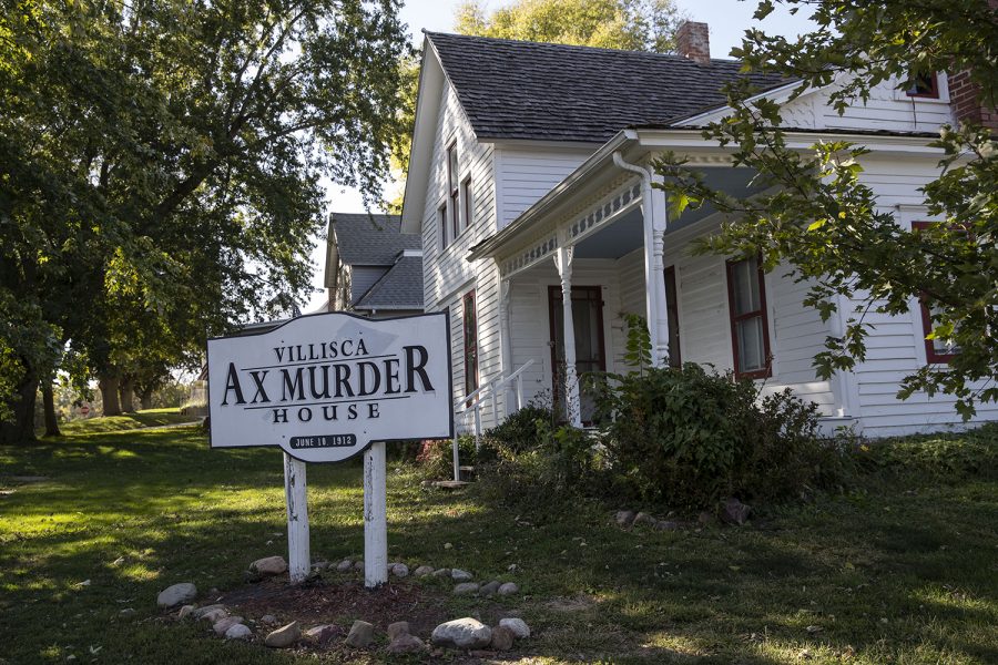 The+Villisca+Ax+Murder+House+is+seen+in+Villisca%2C+Iowa+on+Sept.+30%2C+2020.+Villisca+is+the+site+of+one+of+the+oldest+cold+cases+in+Iowa+in+which+eight+people+were+murdered+in+their+beds.+The+killer+was+never+found%2C+sparking+many+theories+and+interest+in+the+case.+The+house%2C+which+was+renovated+and+reopened+as+a+museum+to+the+public%2C+is+now+the+site+of+paranormal+activity+and+attracts+thousands+of+tourists+every+year.+The+date+on+the+sign%2C+June+10%2C+1912+is+the+morning+the+Moore%E2%80%99s+and+Stillinger+children+were+found+murdered.+