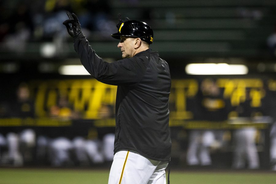 Iowa head coach Rick Heller gestures to his team during a baseball game between Iowa and Grand View at Duane Banks Field on March 3, 2020. The Hawkeyes defeated the Vikings 15-2.