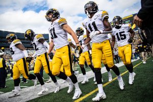 Iowa players take the field during a football game between Iowa and Michigan in Ann Arbor on Saturday, October 5, 2019. The Wolverines celebrated homecoming and defeated the Hawkeyes, 10-3. 