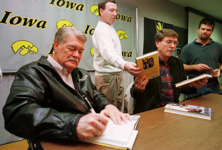 Former+University+of+Iowa+head+football+coach+Hayden+Fry+signs+copies+of+his+book+A+High+Porch+Picnic+Tuesday+March+2%2C+1999+at+the+Jacobsen+athletic+building+in+Iowa+City.+