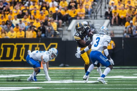 Iowa running back Tyler Goodson breaks a tackle during a football game between Iowa and Middle Tennessee State University on Saturday, September 28, 2019. The Hawkeyes defeated the Blue Raiders 48-3.  