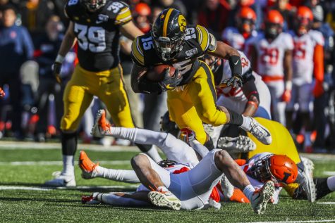 Iowa running back Tyler Goodson carries the ball during the football game against Illinois on Saturday, November 23, 2019. The Hawkeyes defeated the Fighting Illini 19-10. 