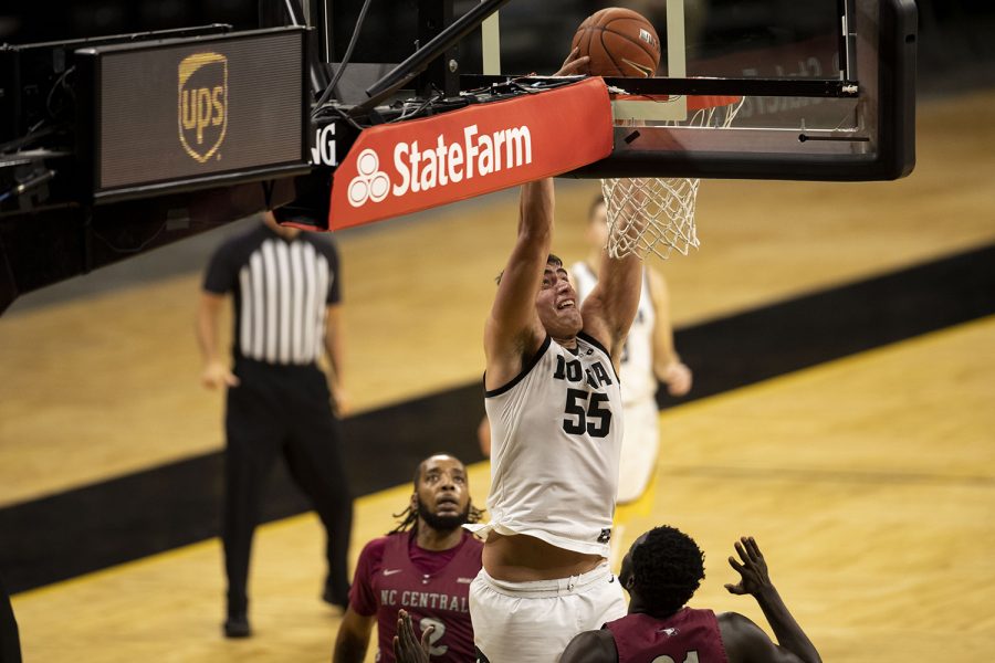Iowa center Luka Garza dunks the ball during the second half of the first Iowa men’s basketball game of the season against the North Carolina Central Eagles at Carver-Hawkeye Arena on Wednesday, Nov. 25, 2020. The Hawkeyes defeated Eagles 97-67. (Jenna Galligan/The Daily Iowan)