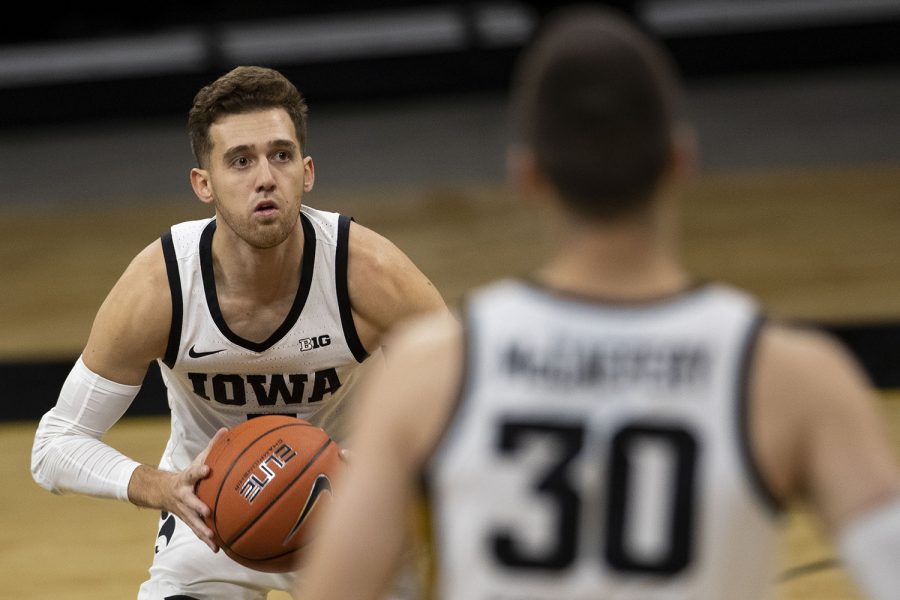 Iowa guard Jordan Bohannon looks to pass during the Iowa men’s basketball game against the Southern University Jaguars at Carver-Hawkeye Arena on Friday, Nov. 27, 2020. The Hawkeyes defeated the Jaguars 103-76 in their first game against them since 2017. (Jenna Galligan/The Daily Iowan)