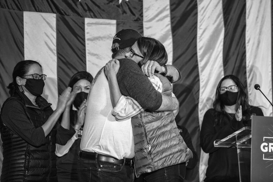 Democratic candidate for senate Theresa Greenfield hugs her husband during a watch party for her campaign on Tuesday, Nov. 3, 2020 at the Renaissance Hotel in Des Moines. With the event closed to the public, about 40 members of the media waited for the election results and Theresa Greenfield to arrive, who gave remarks at 11:45 P.M. after the state unofficially reported the results that she lost the senate race. 