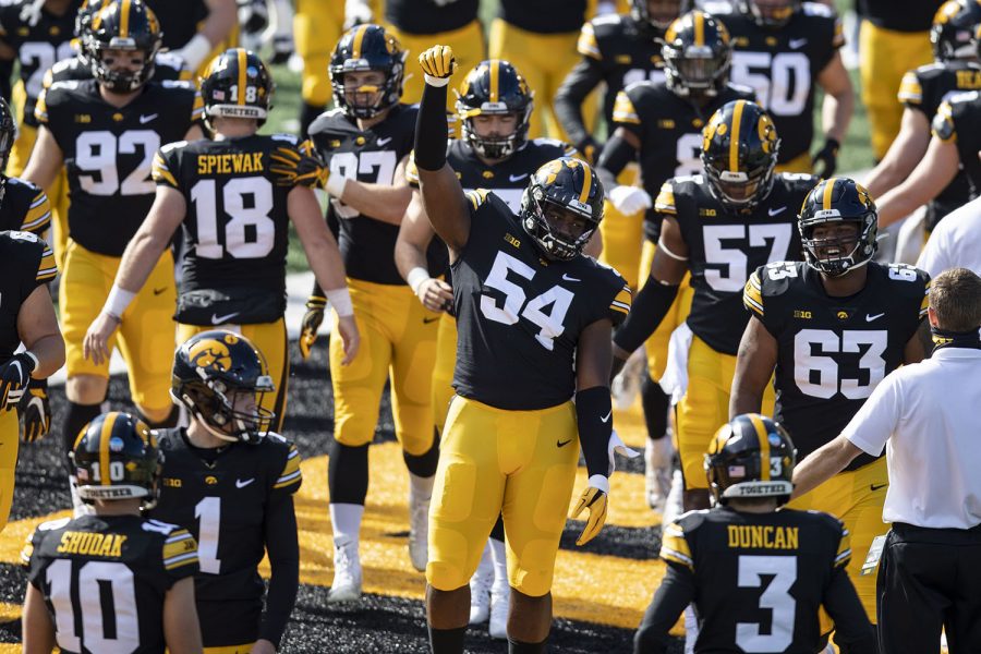 Iowa+Defensive+Tackle+Daviyon+Nixon+raises+his+fist+as+the+Hawkeyes+take+to+their+home+field+for+the+first+time+in+the+season+during+the+Iowa+v+Northwestern+football+game+at+Kinnick+Stadium+on+Saturday%2C+Oct.+31%2C+2020.++The+Wildcats+defeated+the+Hawkeyes+21-20.+