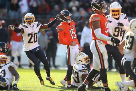 Bears kicker Eddy Pineiro and Chargers defensive back Desmond King react differently after Pineiro missed the would-be game-wining kick. The Bears lost to the Chargers 17-16 at Soldier Field.