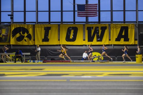 Runners compete in the mile run premier during the Black and Gold Invitational at the University of Iowa Recreation Building on Saturday, Feb. 1, 2020. Grace Rowan of Eastern Illinois led the field with a time of 4:56.26.