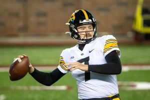 Nov 13, 2020; Minneapolis, Minnesota, USA; Iowa Hawkeyes quarterback Spencer Petras (7) drops back for a pass during pre game warmups before a game against the Minnesota Golden Gophers at TCF Bank Stadium.