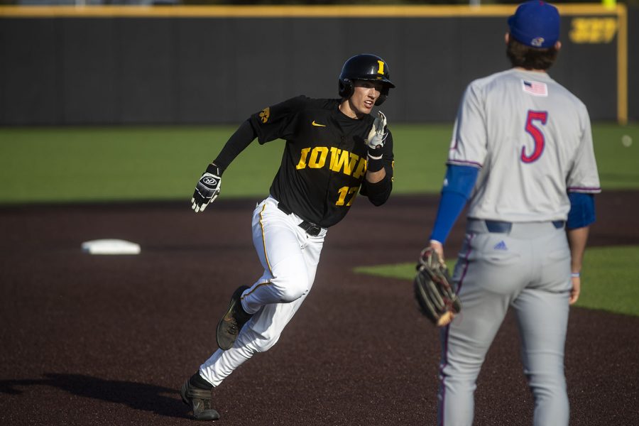 Iowa infielder Dylan Nedved rounds the bases during a baseball game between the Iowa Hawkeyes and the Kansas Jayhawks on Tuesday, March 10, at Duane Banks Field. The Hawkeyes defeated the Jayhawks, 8-0. 