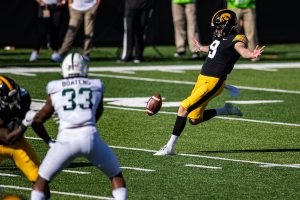 Iowa punter Tory Taylor kicks the ball during a football game between Iowa and Michigan State in Kinnick Stadium on Saturday, Nov. 7, 2020. The Hawkeyes dominated the Spartans, 49-7. 