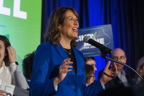 Iowa 3rd Congressional District-elect Cindy Axne speaks to supporters during the statewide Democratic candidates watch party at Embassy Suites in Des Moines on Wednesday, Nov. 4, 2020. 