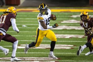 Iowa Hawkeyes running back Tyler Goodson (15) rushes with the ball for a first down in the first half against the Minnesota Golden Gophers on Friday, Nov. 13, 2020 at TCF Bank Stadium in Minneapolis. (Jesse Johnson/USA TODAY Sports)