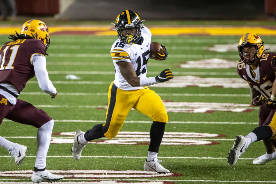 Iowa+Hawkeyes+running+back+Tyler+Goodson+%2815%29+rushes+with+the+ball+for+a+first+down+in+the+first+half+against+the+Minnesota+Golden+Gophers+on+Friday%2C+Nov.+13%2C+2020+at+TCF+Bank+Stadium+in+Minneapolis.+%28Jesse+Johnson%2FUSA+TODAY+Sports%29