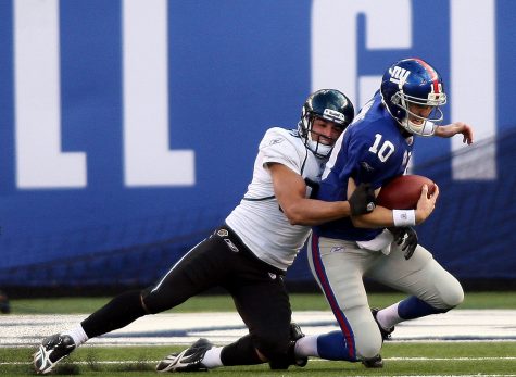 Jacksonville Jaguars Sean Considine sacks New York Giants quarterback Eli Manning during NFL action at the New Meadowlands Stadium in East Rutherford, New Jersey, Sunday November 28, 2010. The Giants won, 24-20. (Joe Rogate/Newsday/MCT)