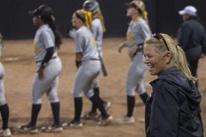 Iowa Head Coach Renee Gillespie walks to join the team during an Iowa softball game against Iowa Central at Pearl Field on Friday, October 4, 2019. The Hawkeyes defeated the Tritons 4-0 in 10 innings.
