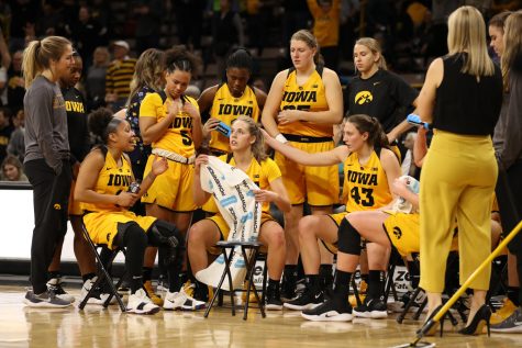 The Iowa Womens Basketball team huddles up on a time out during a basketball game against Michigan State on Thursday, Feb. 7, 2019. The Hawkeyes defeated the Spartans 86-71.