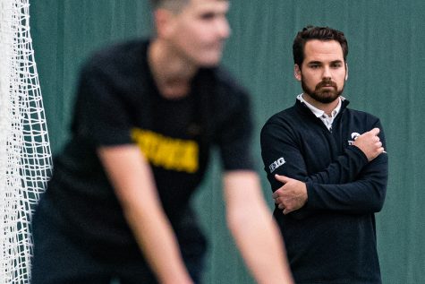 Iowa head coach Ross Wilson watches his team during a mens tennis match between Iowa and Texas Tech at the HTRC on Thursday, Jan. 16, 2020. The Red Raiders defeated the Hawkeyes, 4-3.
