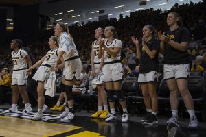 Iowa players celebrate after scoring during a women’s basketball game between Iowa and Penn State at Carver Hawkeye Arena on Saturday, Feb. 22, 2020. The Hawkeyes defeated the Nittany Lions, 100-57.