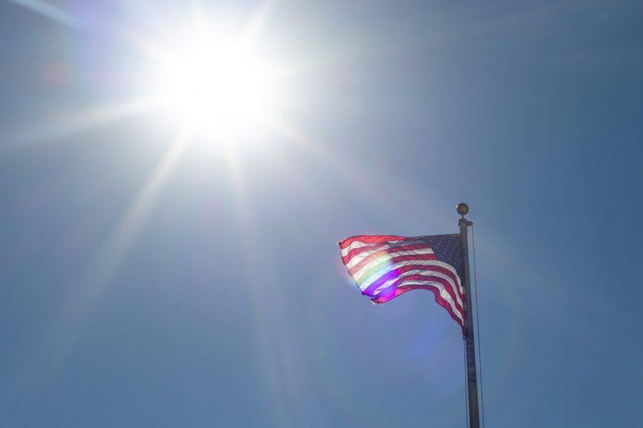 The American flag moves in the wind in front of Wilton Library and Community Center on voting day. Wilton, IA, home to Iowa Rep. Bobby Kaufman, welcomes voters to vote on Tuesday for the 2020 General Elections. 