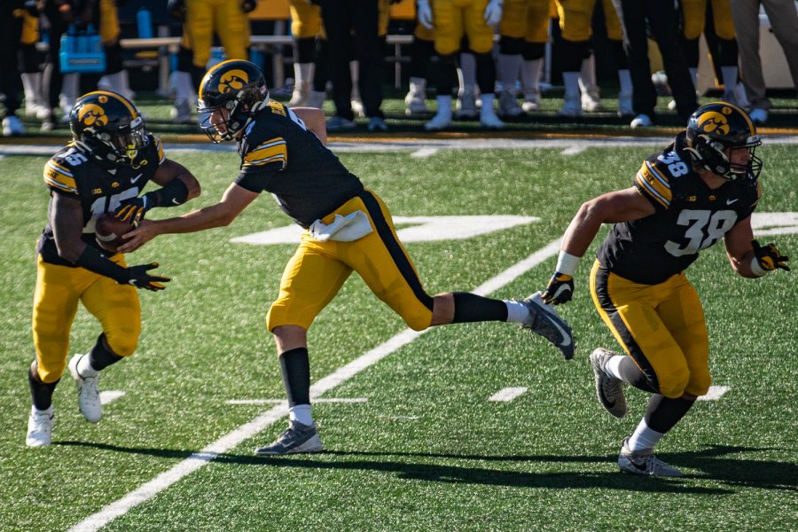 Iowa running back Tyler Goodson carries the ball during a football game between Iowa and Michigan State in Kinnick Stadium on Saturday, Nov. 7, 2020. The Hawkeyes dominated the Spartans, 49-7. 