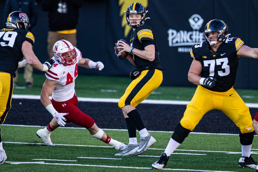 Iowa quarterback Spencer Petras attempts a pass during a football game between Iowa and Nebraska at Kinnick Stadium on Friday, Nov. 27, 2020. Petras moves to 4-2 as IowaÕs starter this season.